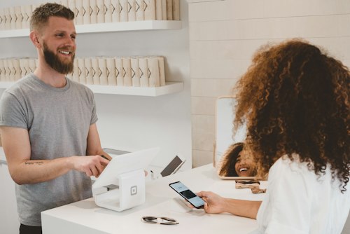 Customer tapping to pay